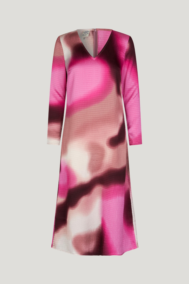 Amilo Dress Pink Fade This midi-length column dress features a V-neck, zip closure in the back, and slits at the ends of the sleeves - front image