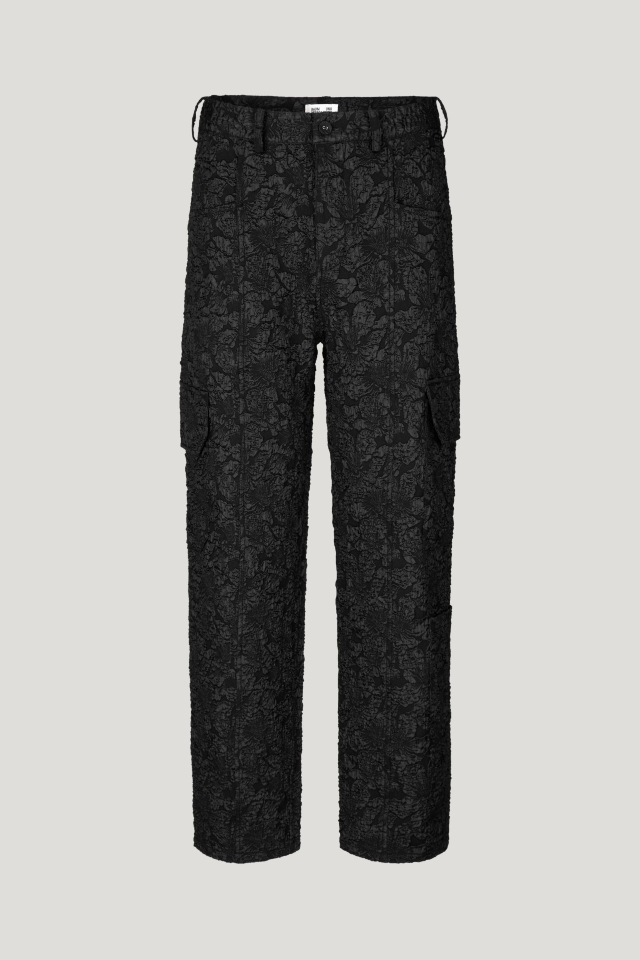 Nachi Trousers Black These ankle-length, mid-rise jacquard trousers feature a zip fly with button closure - front image