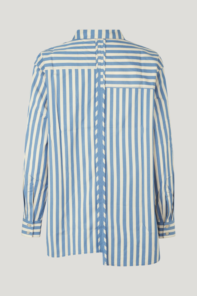 Molli Shirt Wide Blue Stripe This collared, button-up shirt features an asymmetrical hem, buttoned cuffs, and a patch pocket at the chest - back image