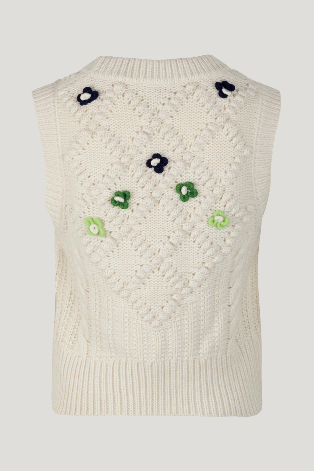Corry Vest Cream This sleeveless, thick knit cropped vest features a cable-knit pattern and floral detailing - back image