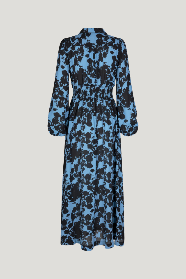 Amber Dress Blue Flower Jacquard This collared maxi dress features a button closure at the neckand stretchy smocking at the waist for a comfortable fit - back image