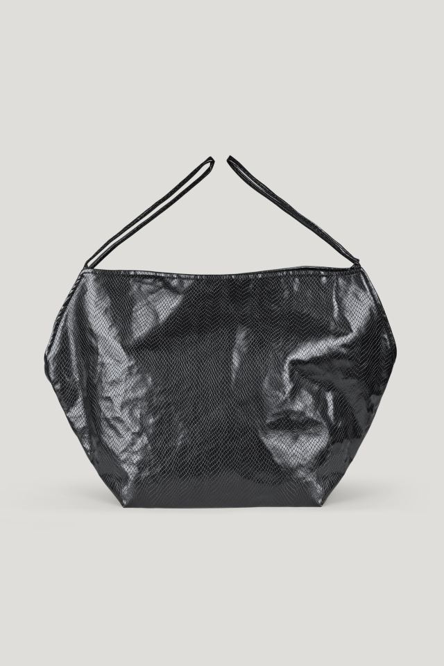 Kamilla Bag Black Snake This soft tote bag features handles on both sides and a magnetic closure in the middle - front image