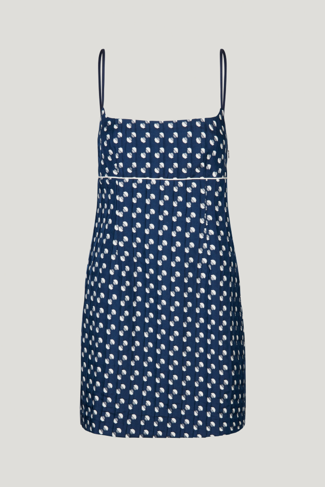 Alvera Dress Blue Jacquard Dot This jacquard minidress features spaghetti straps, a zip closure at the side, and an empire waist - front image
