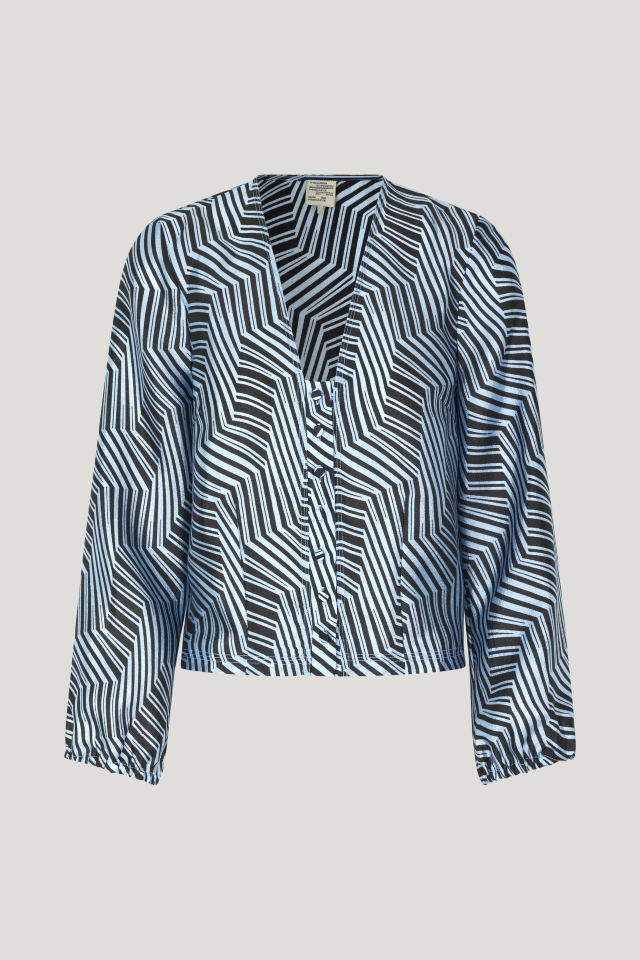 Miriana Blouse Blue Zebra This cropped top features button closures in the front, a dipped hem, and elasticated sleeves - front image