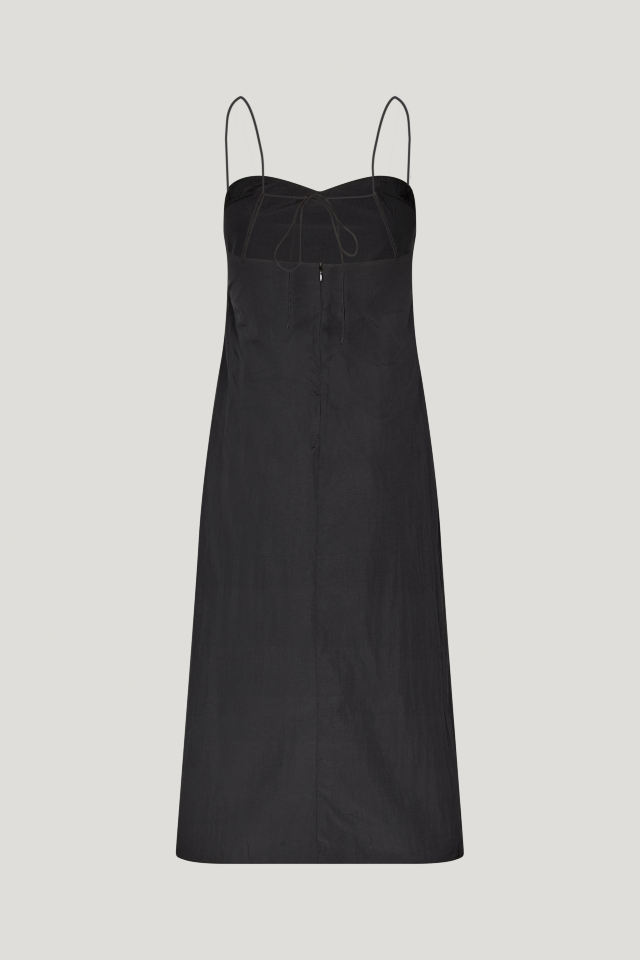 Aleena Dress Black This slip-style dress feature a slight sweetheart neckline, zip closure in the back, and adjustable straps that are connected in the back - back image