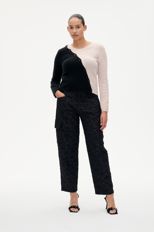 Nachi Trousers Black These ankle-length, mid-rise jacquard trousers feature a zip fly with button closure - model image